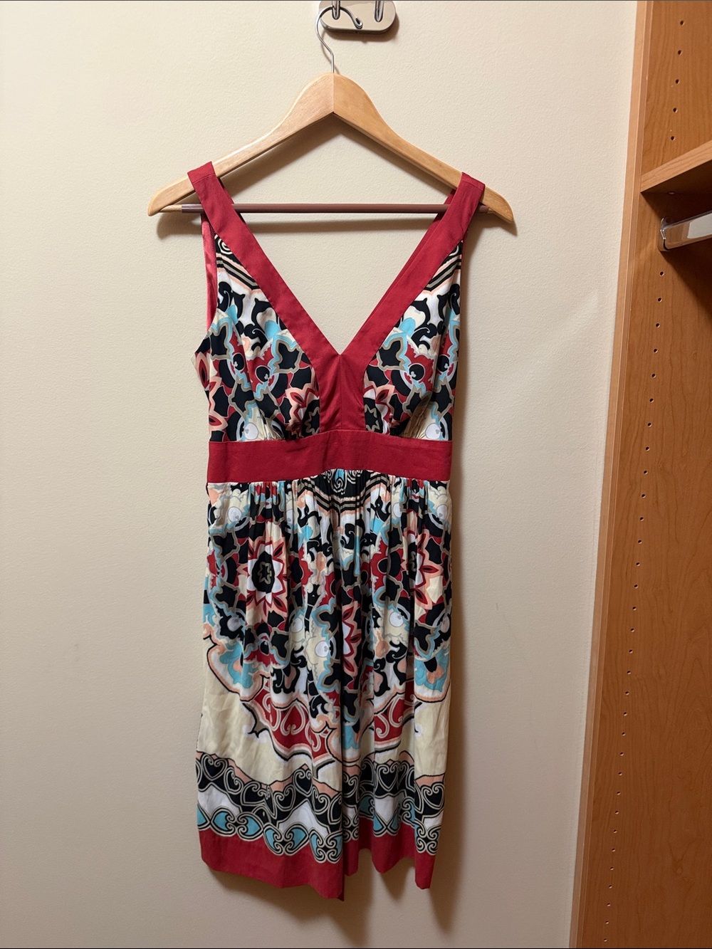 Sleeveless V-Neck Midi Dress with Red Trim and Multicolor Mosaic Print